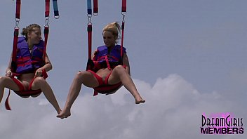 Bikinied Teens Parasailing