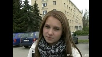 A Lovely Brunette Girl Giving A Street Blowjob