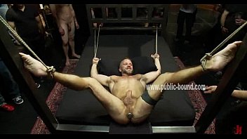 Bondage Devices Hold Immobilized Gay Sex Slave Force To Please Group Of Bondage Masters