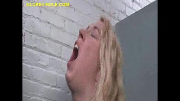 Big Stacked Blonde Sucks Huge Dong Through Fitting Rooms Glory Hole