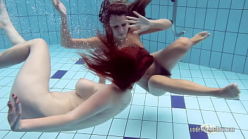 Two Bound Babes Submerged In Water