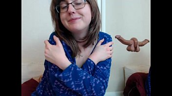 Cute Teen With Glasses Flashes On Webcam