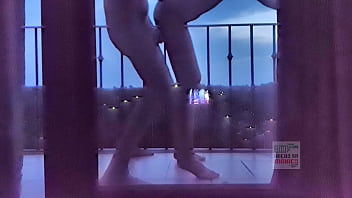 2 Cute Girls Kissing Passionately On The Hotels Balcony In The Mountains