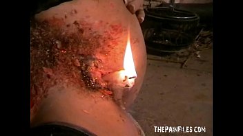 Beautiful Submissive Gives Rimjobs While Tortured With Wax