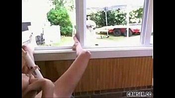 Beautiful Blonde Chick Teasing In Window