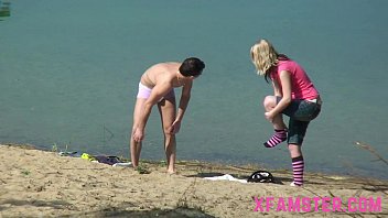 Undressing at the beach