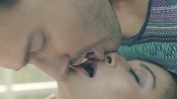 Surveen chawla kiss