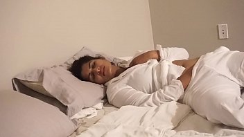 Actress in bed