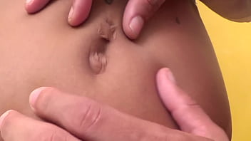 Playing with belly button