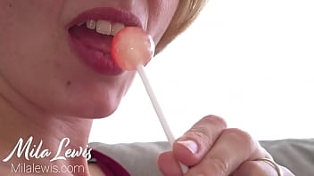 Sucking on lollipop