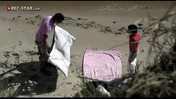 Casal transando na praia