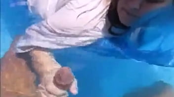 Underwater handjob