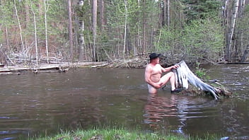 Nude bath in river
